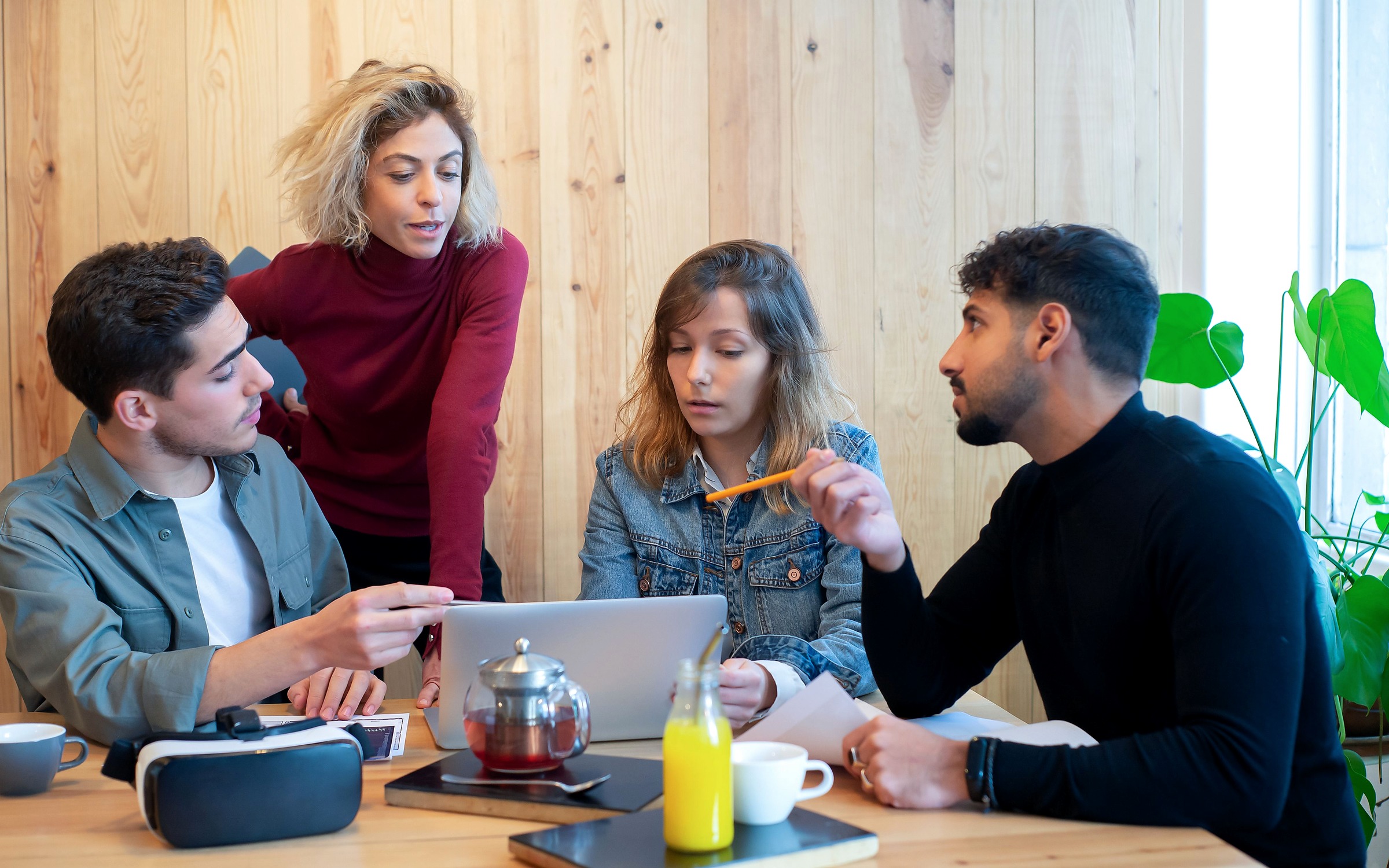 Diverse team collaborating in a modern office