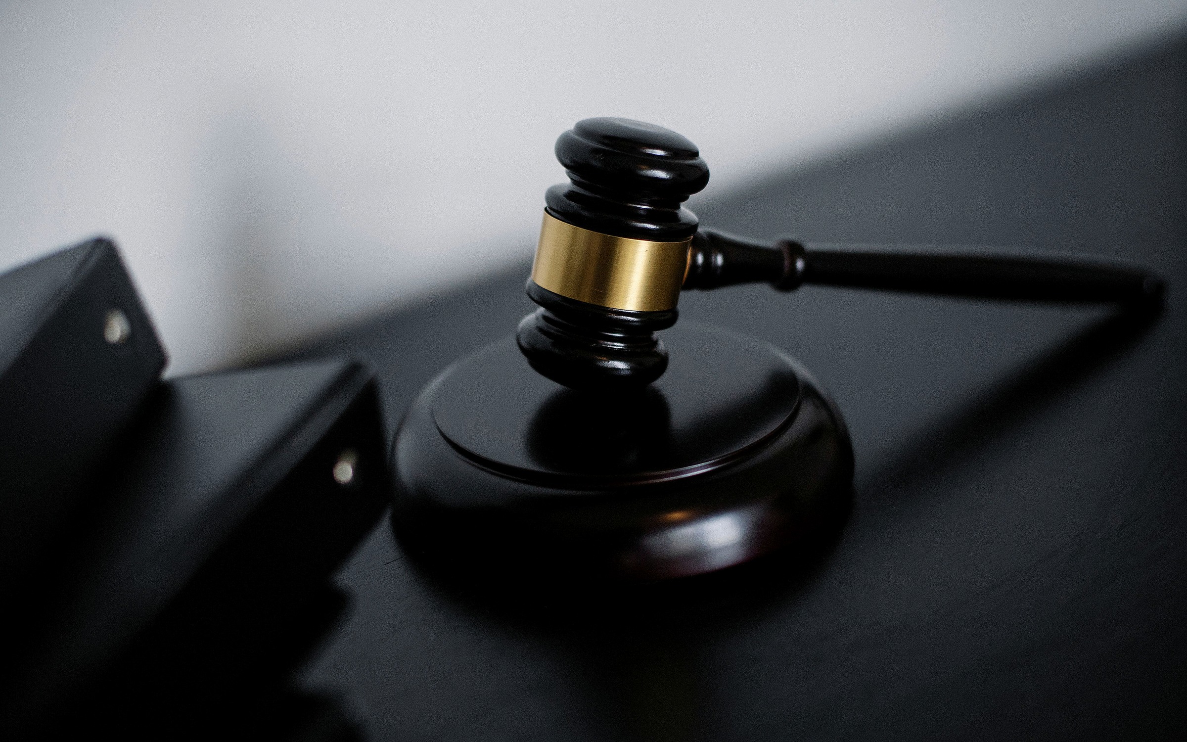 Stack of tribunal case files prepared for review