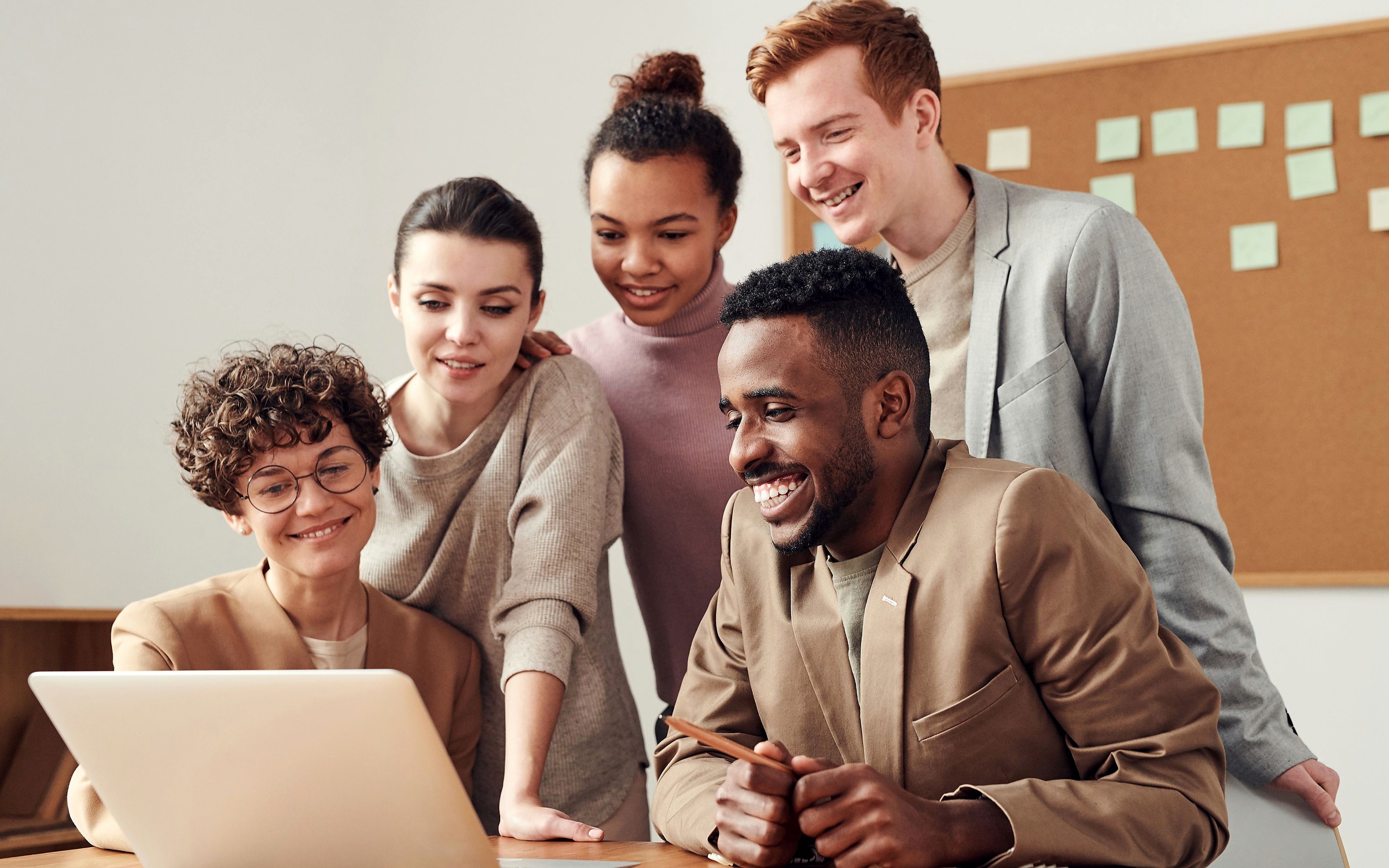 Diverse professionals collaborating to plan their next steps